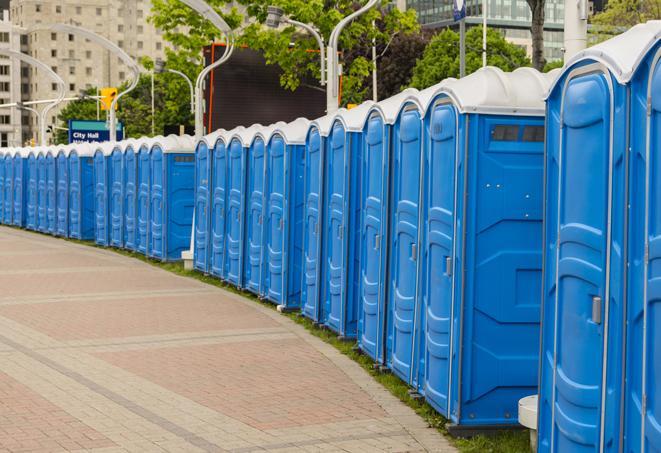 a row of portable restrooms at a fairground, offering visitors a clean and hassle-free experience in madison